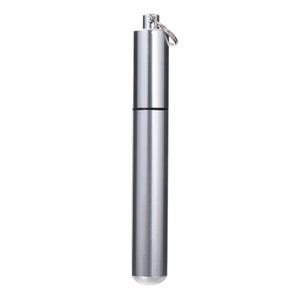 May include: A silver cylindrical container with a keyring attachment. The metal container has a screw-on top and a rounded, white tip. It is designed to hold small items. The container is approximately 10 cm in length.