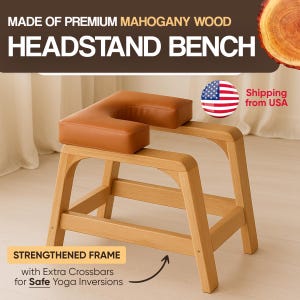 May include: A headstand bench made of premium mahogany wood. The bench has a light brown wooden frame with a brown leatherette headrest. The text on the image reads "HEADSTAND BENCH" and "STRENGTHENED FRAME with Extra Crossbars for Safe Yoga Inversions."