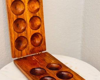 Strategy Game- Pallankuzhi Ancient board game