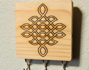 Engraved Kolam design key holders