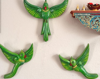 Hand carved wooden flying parrots - set of 3