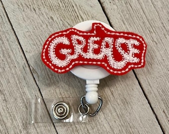 Grease badge reel, movie ID holder, car feltie, badge pull