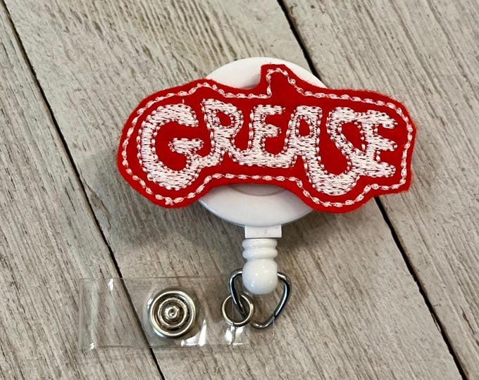 Grease badge reel, movie ID holder, car feltie, badge pull