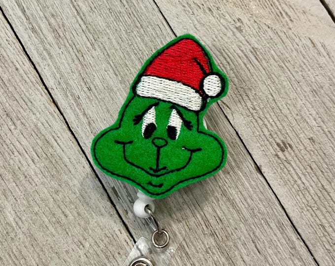 Green guy with Santa hat badge, reel, Santa green guy ID holder, Mean green guy feltie, badge pull