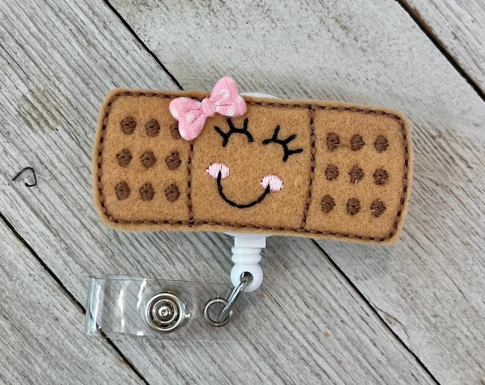 Happy Band-Aid badge reel, happy Band-Aid ID holder, Band-Aid feltie, badge pull
