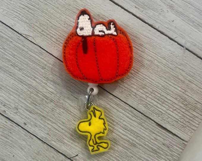White dog on pumpkin badge, dog on pumpkin feltie, pumpkin with dog ID holder, badge pull