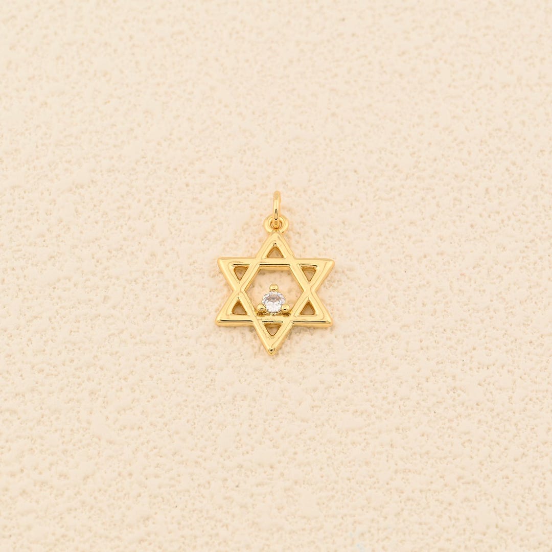 Minimal Six Point Star Jewelry Piece Highlighted by a CZ Center for ...