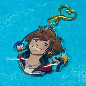 May include: A set of three ceramic mugs with a speckled, matte finish. The mugs are in shades of cream, light gray, and dark gray. Each mug has a simple, minimalist design, perfect for coffee or tea.