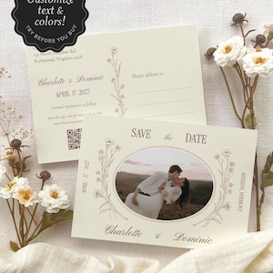 May include: A cream-colored Save the Date card featuring a central oval photograph of a couple, surrounded by line-art floral illustrations. The text reads SAVE the DATE, Charlotte & Dominic, April 17 2027, and Addison, Vermont, with a QR code.