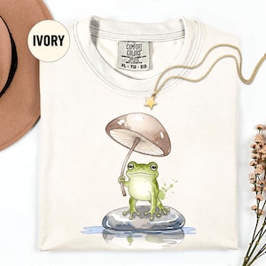 Pilz Frosch T-Shirt – Cottagecore Fliegenpilz Regenschirm Grafik