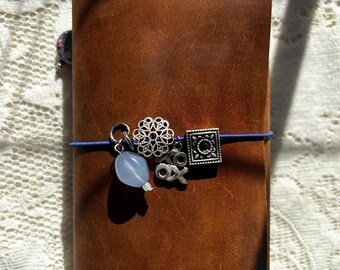 Distressed Leather A6 Traveler's Notebook – Silver Charms, Blue Accents