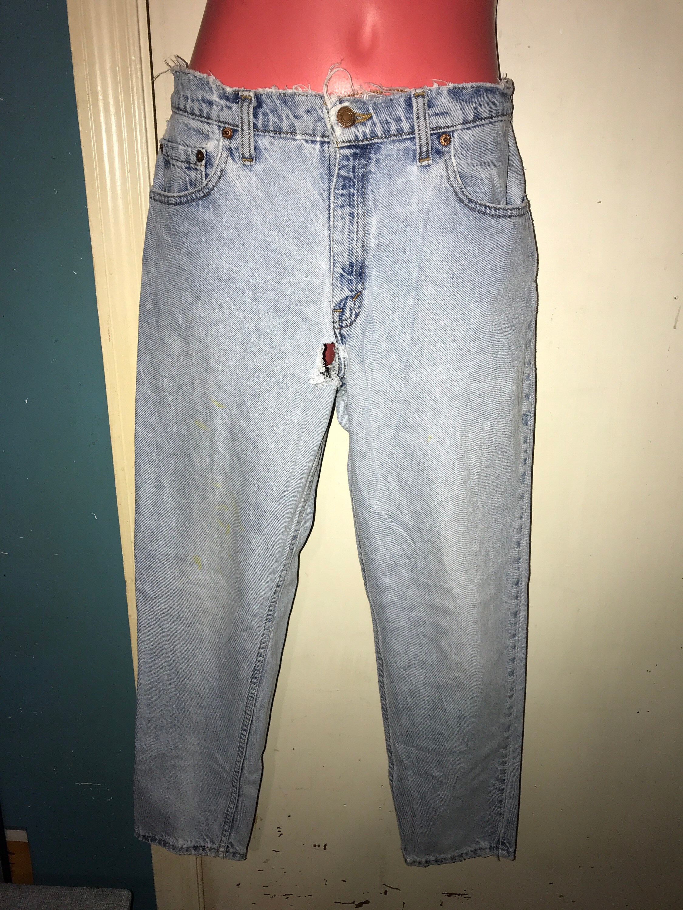 levi jeans with holes in them