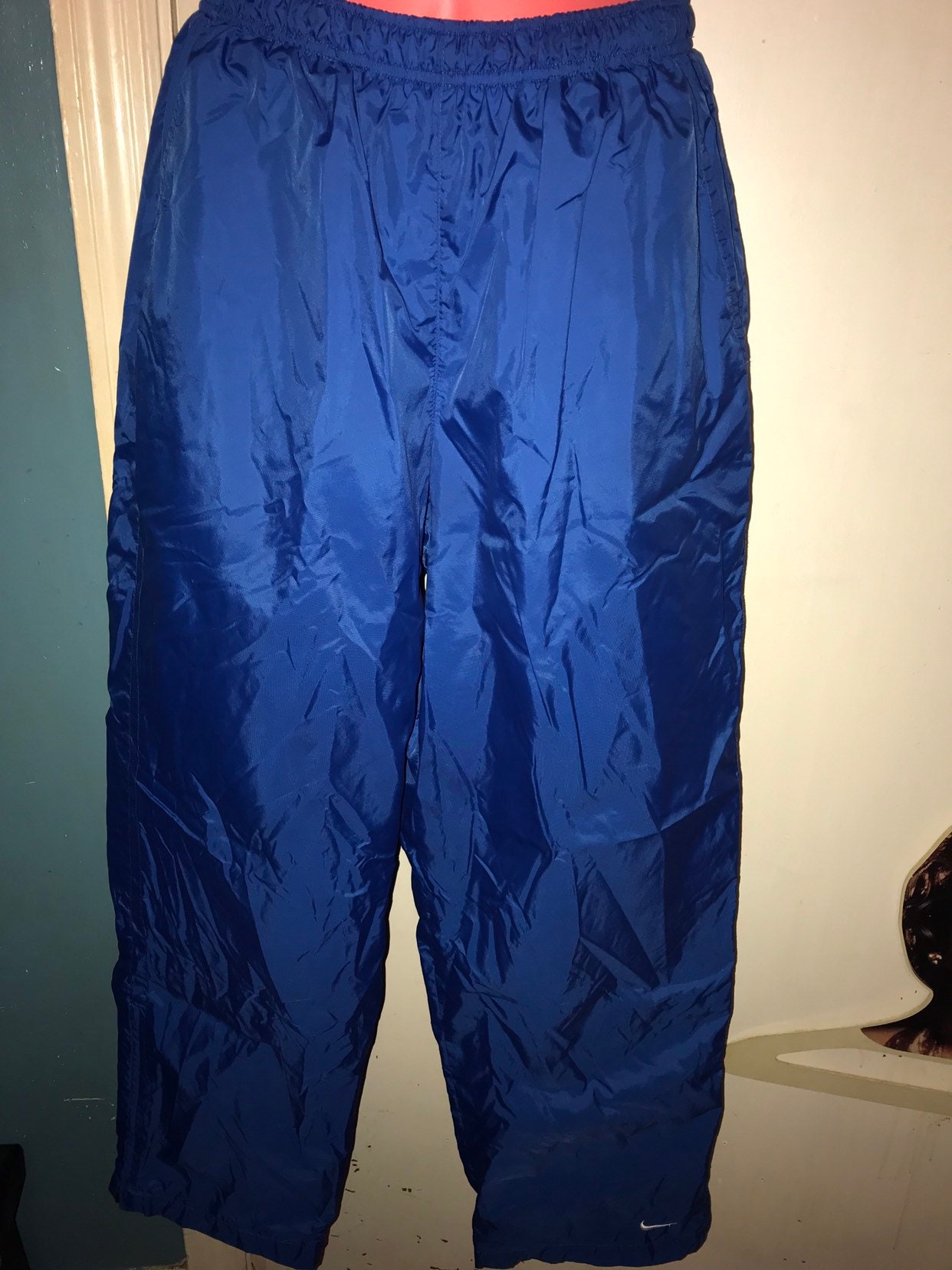 blue nike windbreaker pants