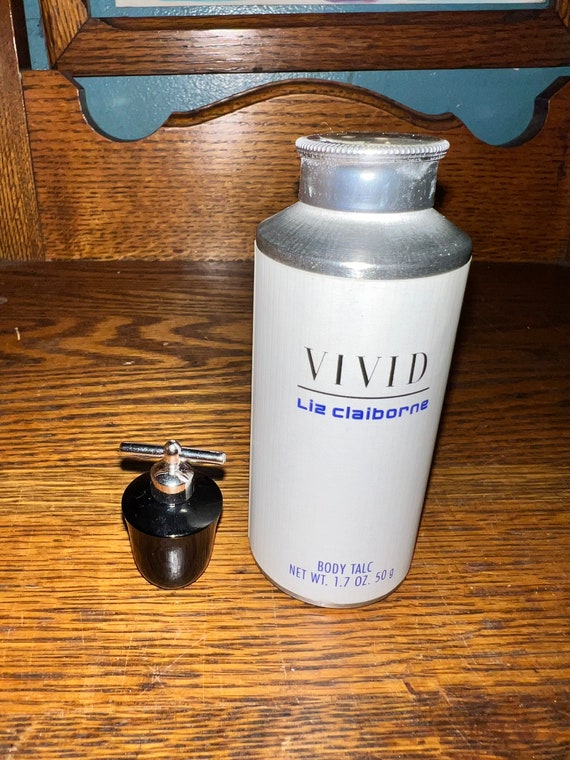 Vintage Vivid by Liz Claiborne Perfume. Miniature Vivid by Liz Claiborne. 1/8 Fluid Oz. Vivid Perfume and Body Talc