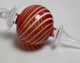 red and white swirled blown glass needle ornament