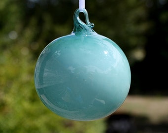 aqua gumball blown glass ornament.