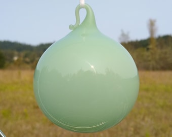 Mint green gumball blown glass ornament.