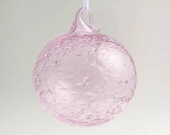 Pink water globe ornament