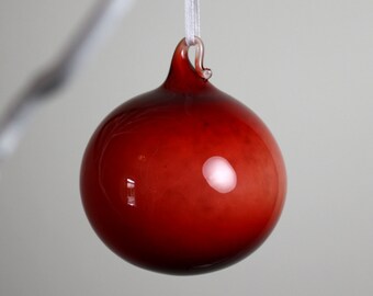 red gumball blown glass ornament.