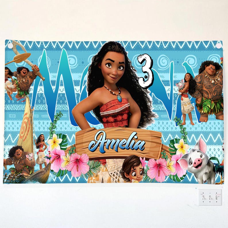 May include: A rectangular banner featuring Moana characters, the number 3, and the name Amelia on a wooden sign. The background is light blue with tribal patterns, pink hibiscus flowers, and green leaves. The design includes Moana, Maui, and Pua.