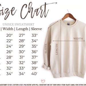 May include: A beige unisex sweatshirt displayed on a hanger, with measurements for width, length, and sleeve length. A size chart lists sizes S to 5XL, with corresponding measurements in inches. The text "Size Chart" is at the top.