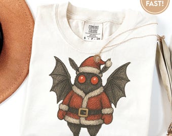 Mothman Christmas Shirt. Funny Cute Cryptid Gift Idea. Fantasy Book Lover T-shirt Tshirt Tee Tees. Moth Man Legend Tee. Santa Claus D272