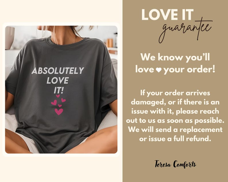 May include: Dark gray t-shirt with the words "ABSOLUTELY LOVE IT!" in white, accompanied by pink heart graphics. The image also includes text that reads "LOVE IT guarantee" and "Teresa Comforts".
