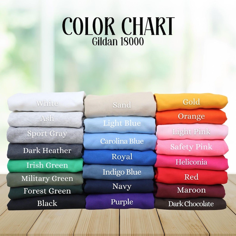 May include: Color chart of Gildan 18000 sweatshirts in various colors, including white, black, and navy. The chart displays a range of hues, from light pink to dark chocolate, for apparel selection.
