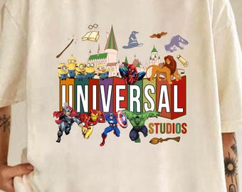 Maglietta mashup Universal Studios, maglietta Marvel Harry Potter Minions Re Leone, viaggio retrò Universal 2026, vacanza coordinata al parco a tema per tutta la famiglia