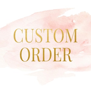May include: A watercolor-style background in shades of pink and peach, with the words "CUSTOM ORDER" in gold lettering. The text is centered and the background has a soft, blended appearance.