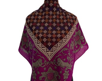 May include: A square scarf with a geometric pattern in brown, orange, and purple. The scarf has a magenta border with floral and cherub designs. The text "LOUIS FERAUD PARIS" is visible.