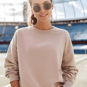 Custom Gildan 18000 sweatshirt is perfect for holiday gifts, family matching sets, or custom cozy wear. Blank crewneck style, soft feel, and DTG/embroidery ready. Great for Christmas, birthdays, or small batch sellers. A reliable blank sweatshirt with bulk order appeal.