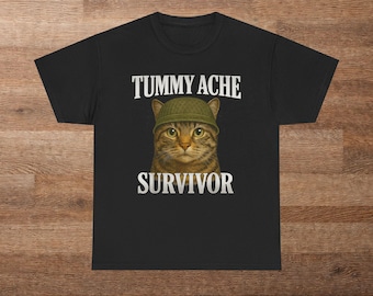 Camiseta unisex de algodón con diseño de gato superviviente de dolor de estómago