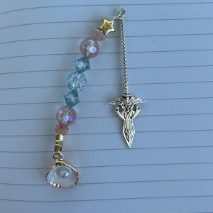 Homemade metal mermaid style bookmark