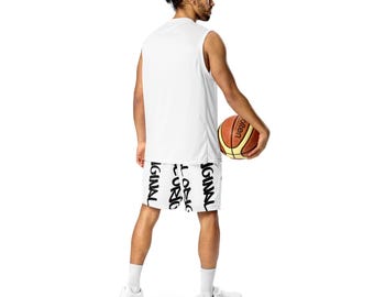 May include: White sleeveless athletic shirt and matching shorts. The shorts have the word "ORIGINAL" in a black graffiti style. A basketball with orange and brown panels is held in the hand.