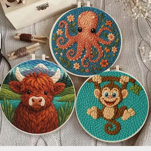 May include: Three embroidered hoops with animal designs. One features an orange octopus with flowers on a blue background. Another shows a Highland cow with a mountain backdrop. The last depicts a monkey hanging from a branch.