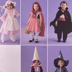 Peut inclure: Patron de couture Simplicity 2571 pour costumes d'enfants. Les costumes incluent Little Bo-Peep, le Petit Chaperon Rouge, un vampire, une fée et une sorcière. La taille du patron est A 1/2, 1, 2, 3 et 4.