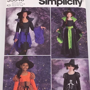 May include: Simplicity sewing pattern S9348 for children's witch costumes in sizes 7-14. The envelope displays four variations of dresses with pointed hats, featuring black, purple, green, and orange fabrics with lace-up details and flared sleeves.