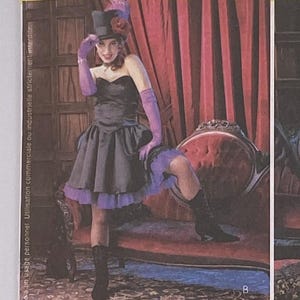 May include: McCall's Costumes sewing pattern featuring four vintage costume designs. The pattern includes a variety of styles, with the text "McCall's Costumes" in large, orange letters. The size is EE (14-16-18-20).