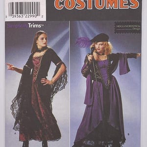 May include: Simplicity Costumes pattern featuring two women in gothic-style dresses. The pattern includes sizes 10, 12, and 14. The image shows a black and burgundy dress with lace sleeves and a purple dress with a black hat.