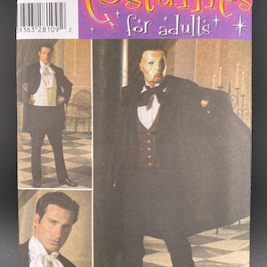 May include: Simplicity costume pattern for adults, featuring a Phantom of the Opera design. The package includes images of a man in a black cape, mask, and formal wear. The pattern number is 482, with sizes XS, S, M, L, and XL.