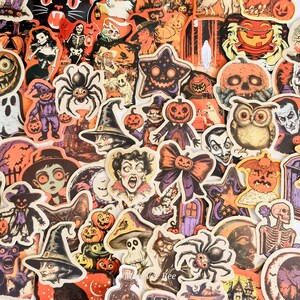 May include: A collection of Halloween-themed stickers featuring various spooky illustrations. The stickers showcase pumpkins, witches, ghosts, spiders, and other classic Halloween characters in orange, purple, and black.