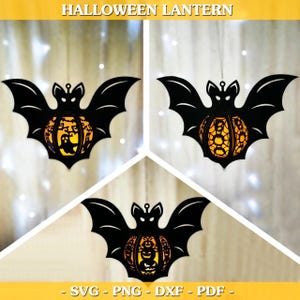 May include: Black bat-shaped Halloween lanterns with intricate pumpkin designs. The lanterns are suspended and feature cut-out details with a warm, glowing interior. The image includes the text "HALLOWEEN LANTERN" and file type options.