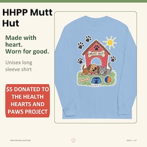 May include: A light blue long-sleeve shirt featuring a colourful crayon-style drawing of a red doghouse labelled MUTT HUT, a brown puppy, a grey kitten, a yellow sun, paw prints, a bone, a blue bowl, and a ball, with the text HHPP below the bowl.