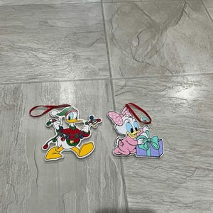 Disney Donald Duck And Baby Daisy Dock Christmas Ornaments