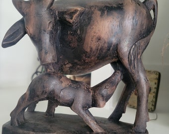 Hand-Carved Haitian Harmony: Wooden Cow and Calf Sculpture