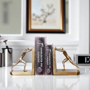 Gold Man Bookend Set – Modern Resin Sculpture Book Holders for Shelf, Desk, or Office – Pushing Figure Bookends for Stylish Decor