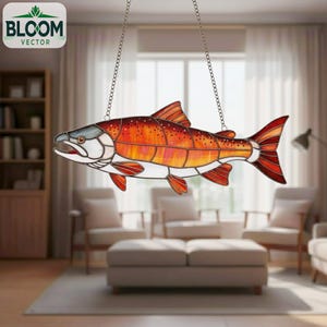 May include: Stained glass fish decoration in shades of orange, red, and white, suspended by chains. The fish features detailed fins and scales, with a silver-colored head. The Bloom Vector logo is in the upper left corner.