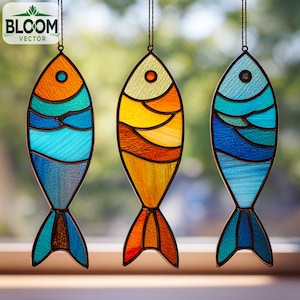 May include: Three stained glass fish ornaments in shades of blue, orange, and yellow hang in front of a window. Each fish has a different color scheme and a black outline. The Bloom Vector logo is in the upper left corner.