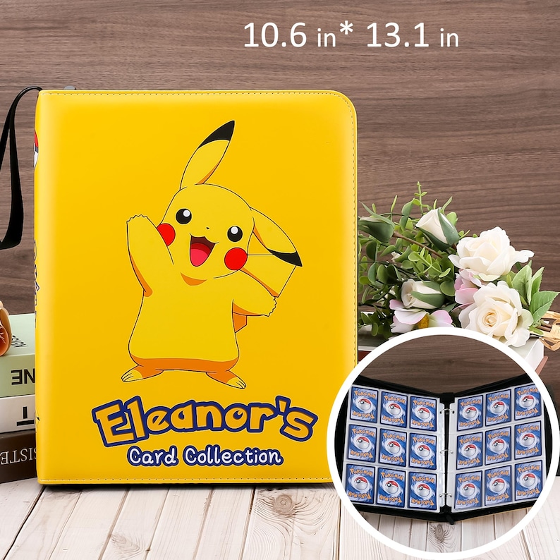 May include: Yellow card binder featuring a Pikachu graphic and the text "Eleanor's Card Collection." The binder measures 10.6 x 13.1 inches and has a black handle. Inside, the binder contains card slots for storing trading cards.